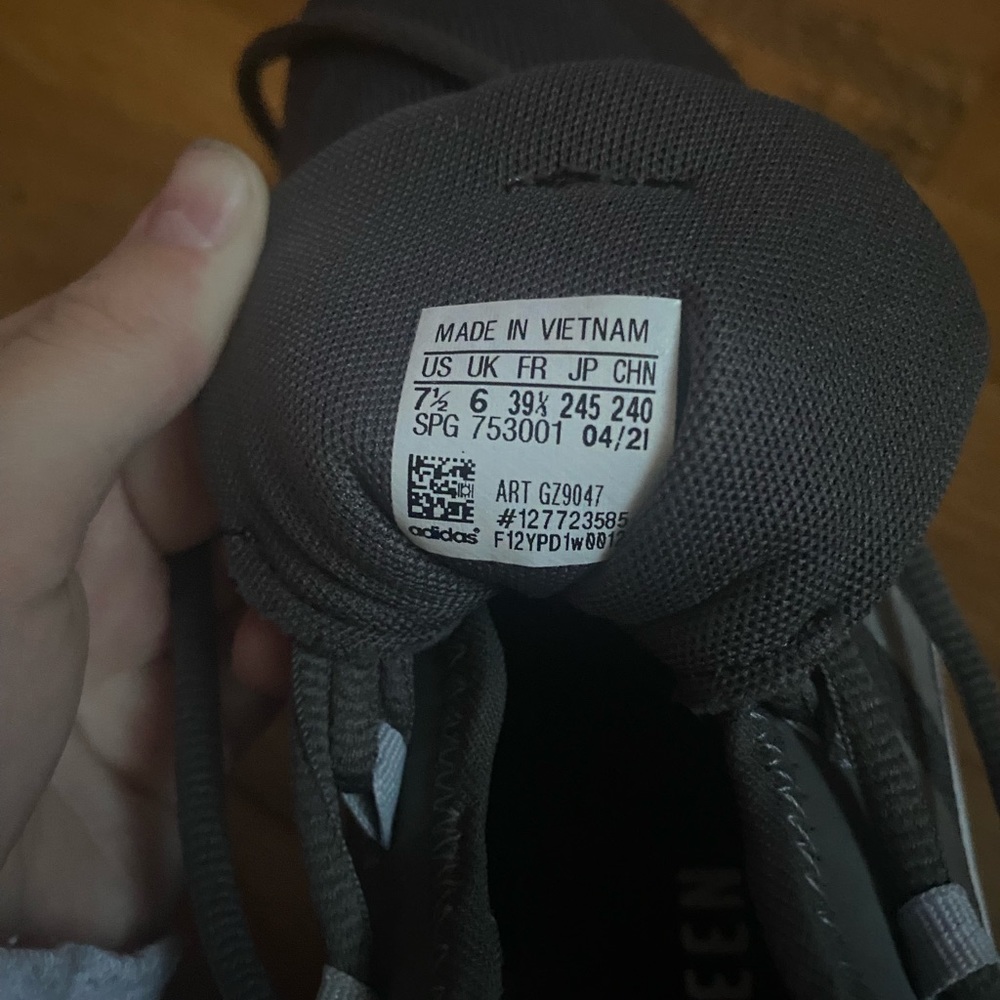 Grey and pink adidas running shoes